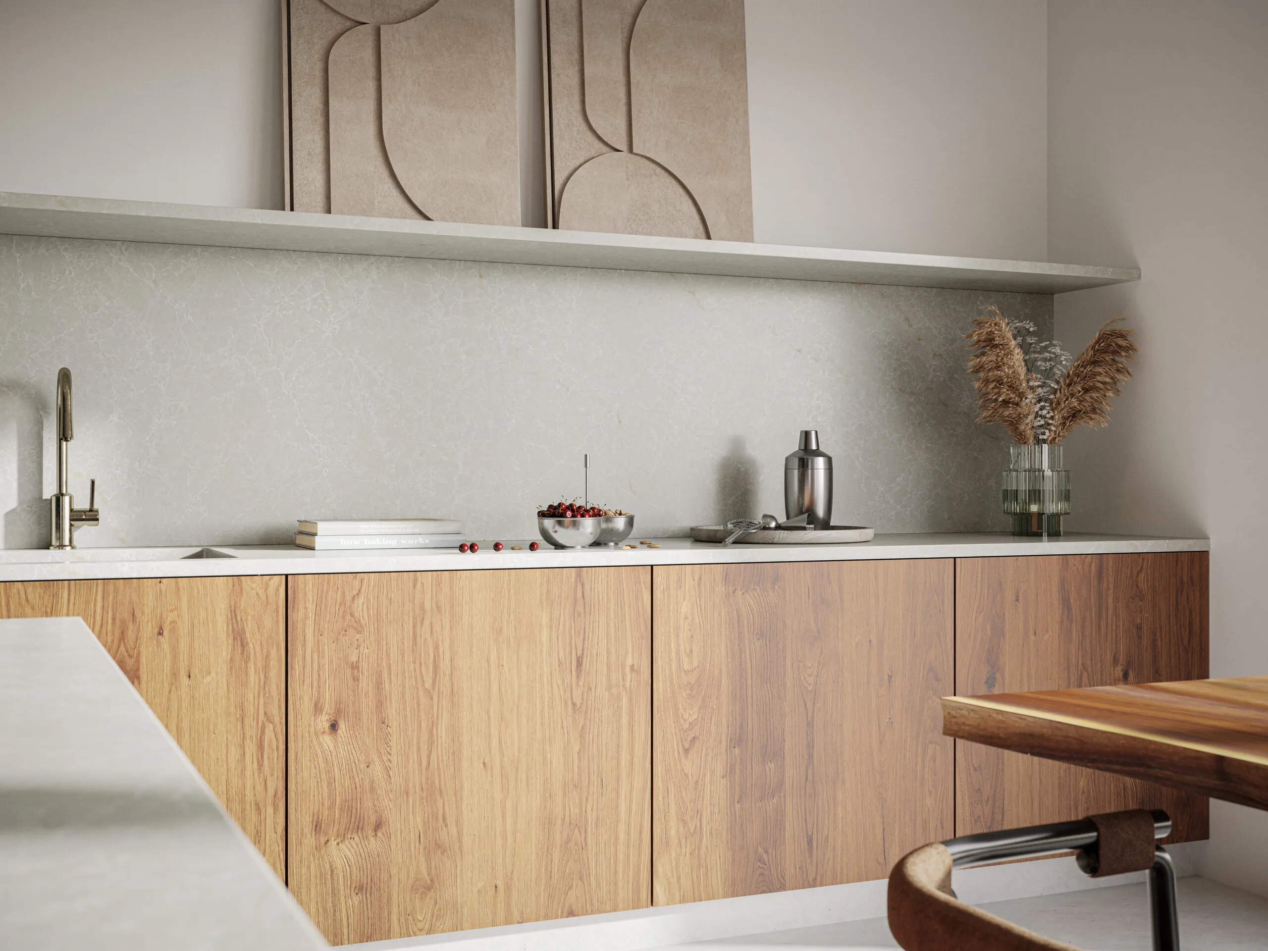 Modern kitchen with Caesarstone light quartz countertop and backsplash, wood cabinets, and minimalist brass faucet.